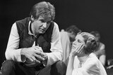 Harrison Ford talks with Carrie Fisher during a break in filming.