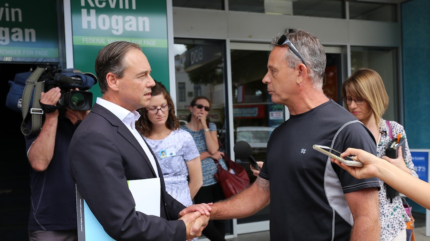 Greg Hunt shakes hands with Rick Pate