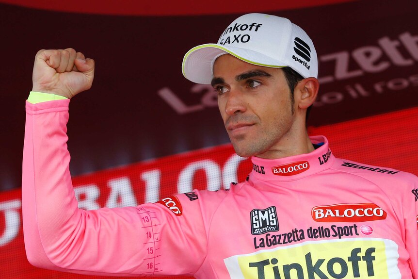 Alberto Contador celebrates with the pink jersey at the Giro d'Italia