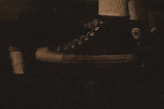 A GIF showing a tapping Converse shoe.