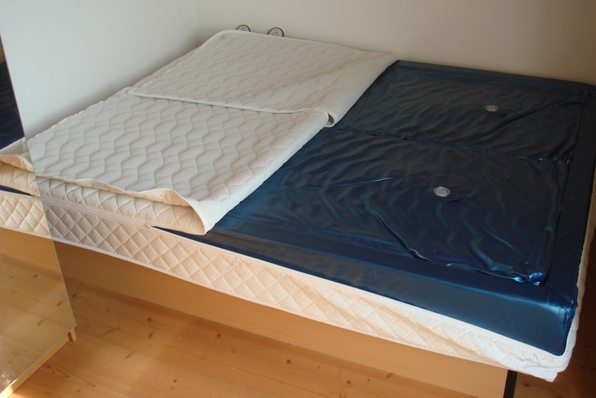 A modern waterbed with two interior bladders