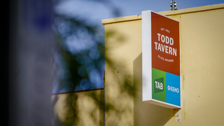A close up shot of a Todd Tavern sign on the side of the Todd Tavern 
