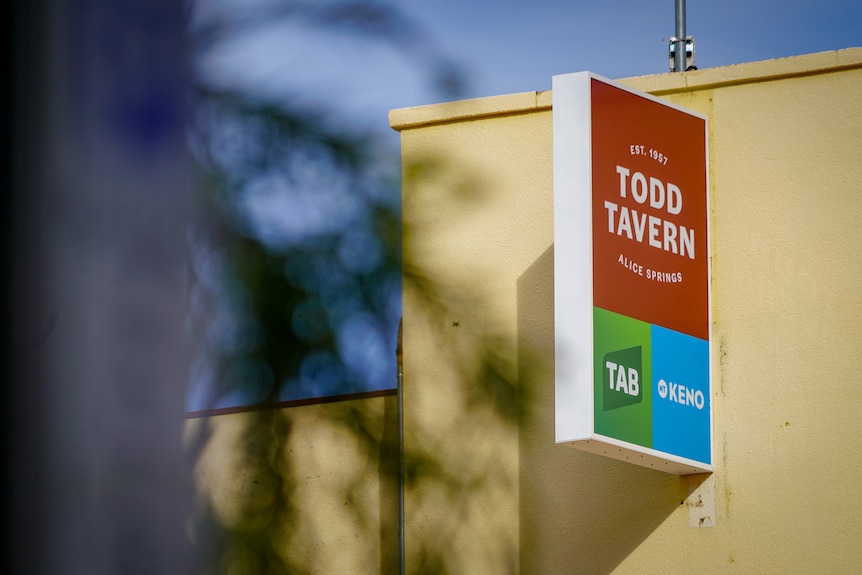 A close up shot of a Todd Tavern sign on the side of the Todd Tavern 
