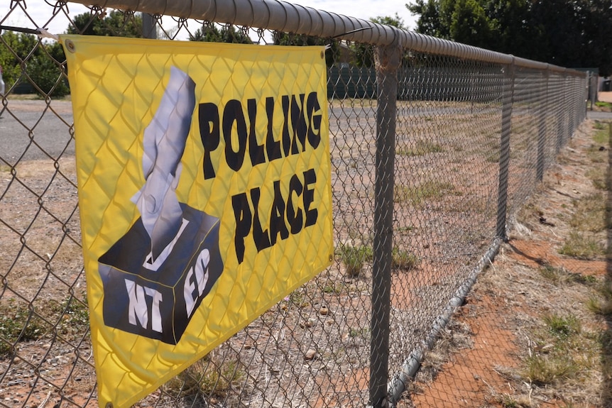 yellow polling place sign