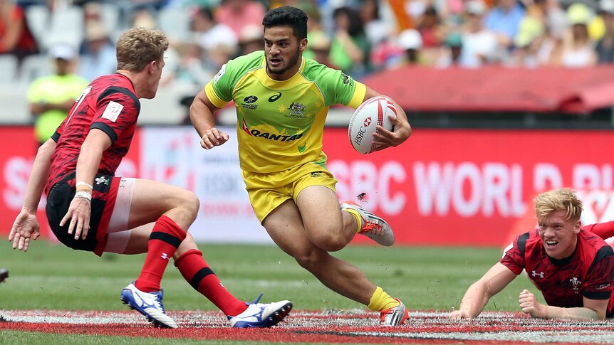 Australia's Stephan van der Walt runs against Wales during day one of the 2015 Cape Town Sevens.