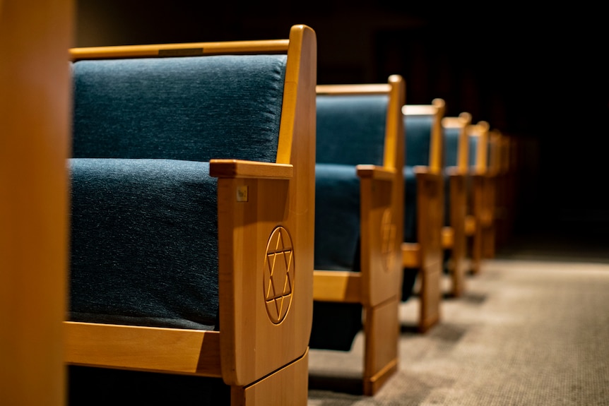 Long benches emblazoned with the Star of David.