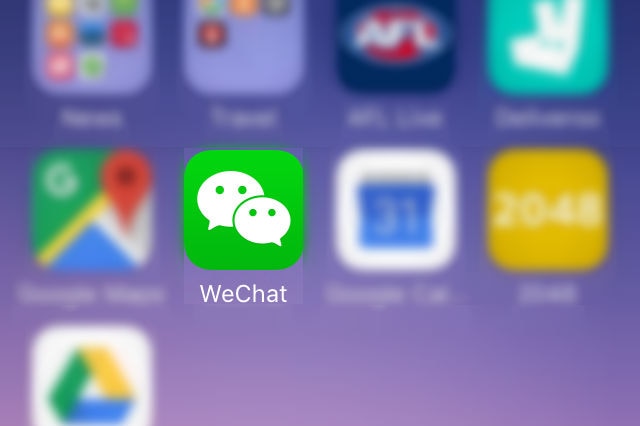 WeChat icon on mobile phone screen.