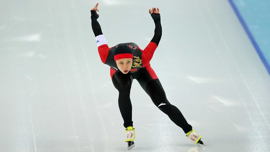 Zhang races to speed skating gold