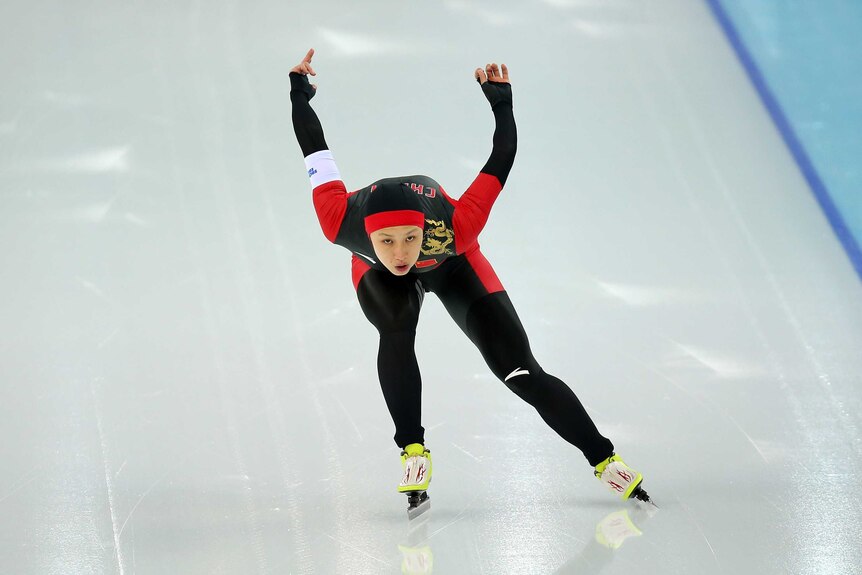 Zhang races to speed skating gold