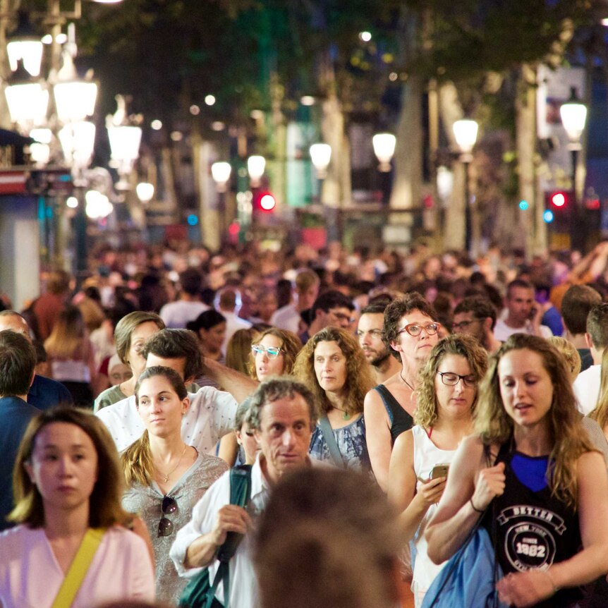 People fill the Las ramblas pedestrian strip following the attack