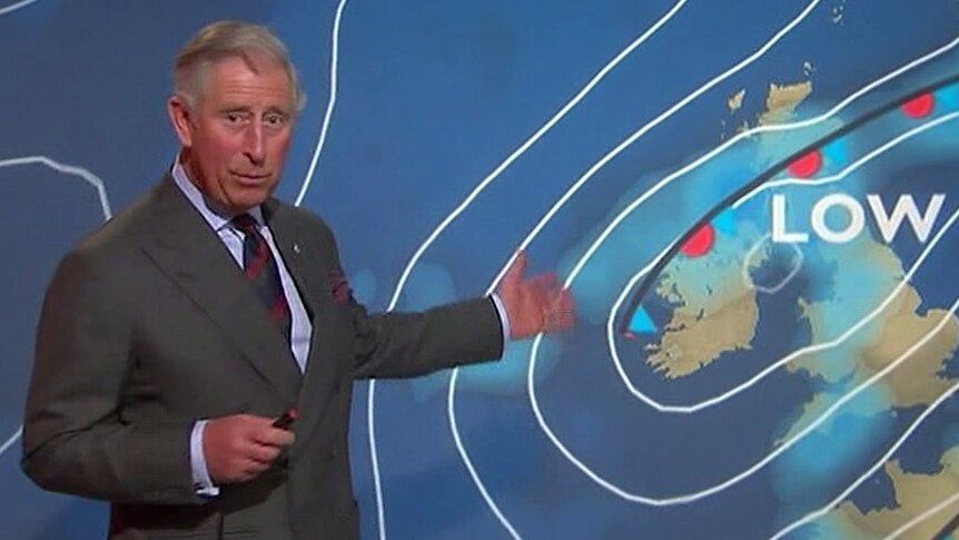 Britain's Prince Charles presents a special weather forecast during a visit to the BBC.