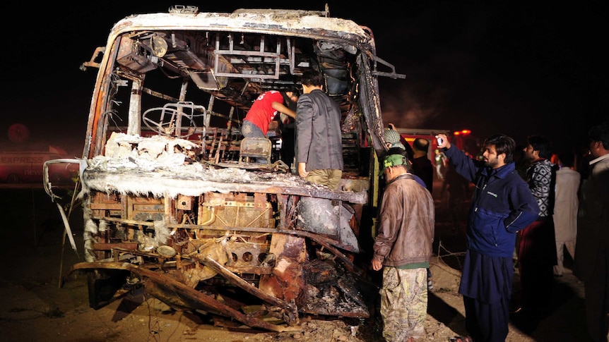 Oil tanker and bus collide in Pakistan