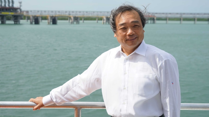 Inpex CEO Takayuki Ueda stands at the gas plant