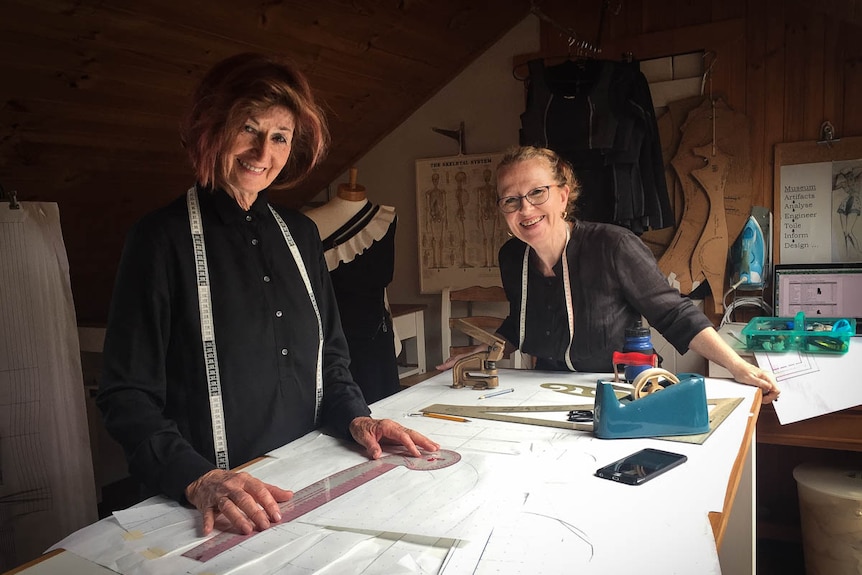 Lois Hennes and Ruth Povall in their pattern engineering studio