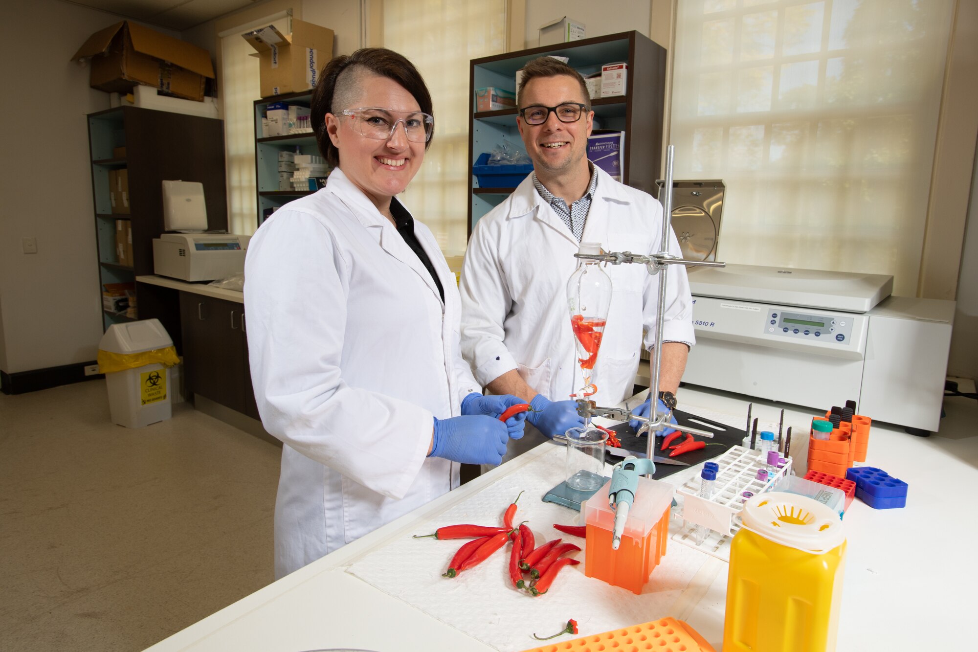 a woman and man in a science lab