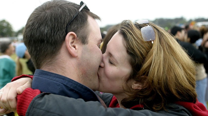 Men see kissing as a means to an end, but for women it means much more, the study has found (File photo).