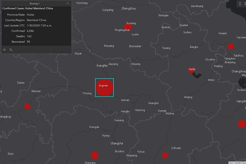 A black map the Chinese province Hubei, with a large red dot near Jingmen.