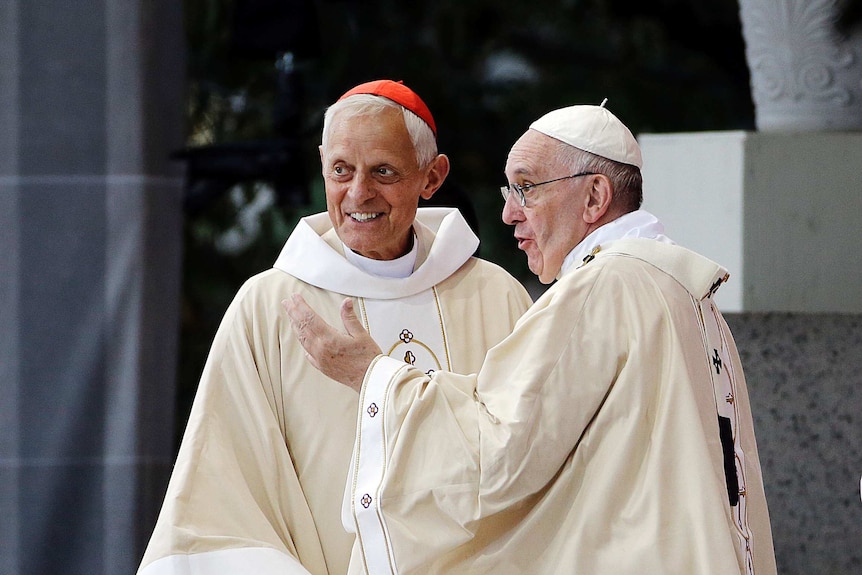 American cardinal Donald Wuerl speaks with Pope Francis