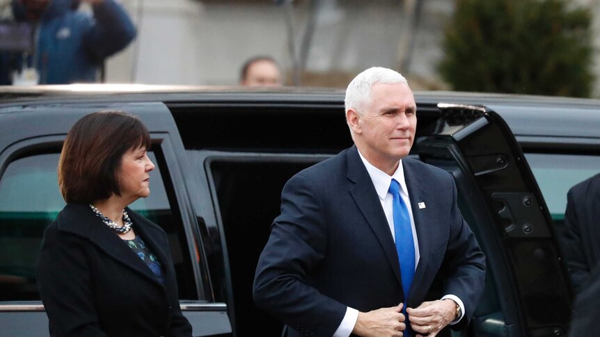 Vice-President elect Mike Pence arrive for the pre-inauguration church service with his wife