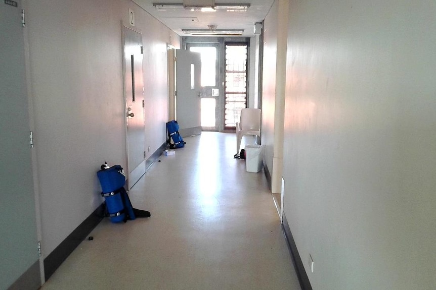 A hallway inside a correctional facility.