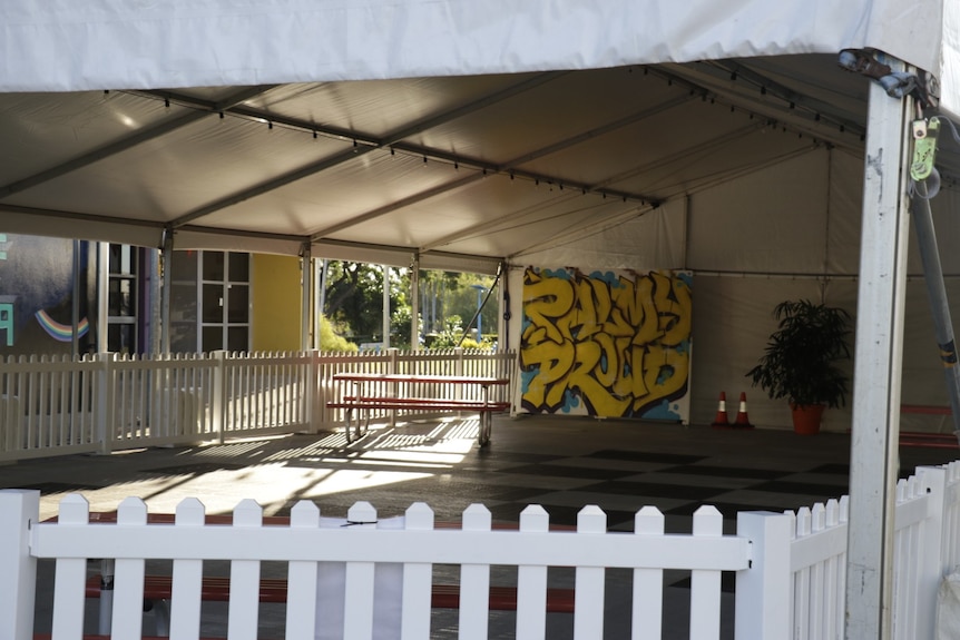 A public space in Palmerston is seen with 'Palmy proud' spray painted on the wall..