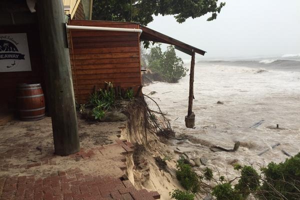 Water washes up over the top of a pathway on Great Keppel Island
