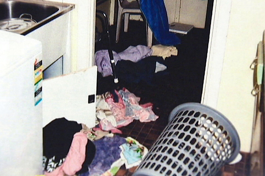 A messy laundry area.