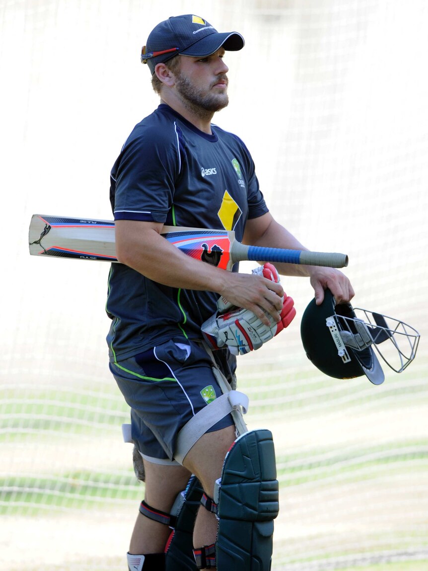 Finch lugs equipment at MCG training