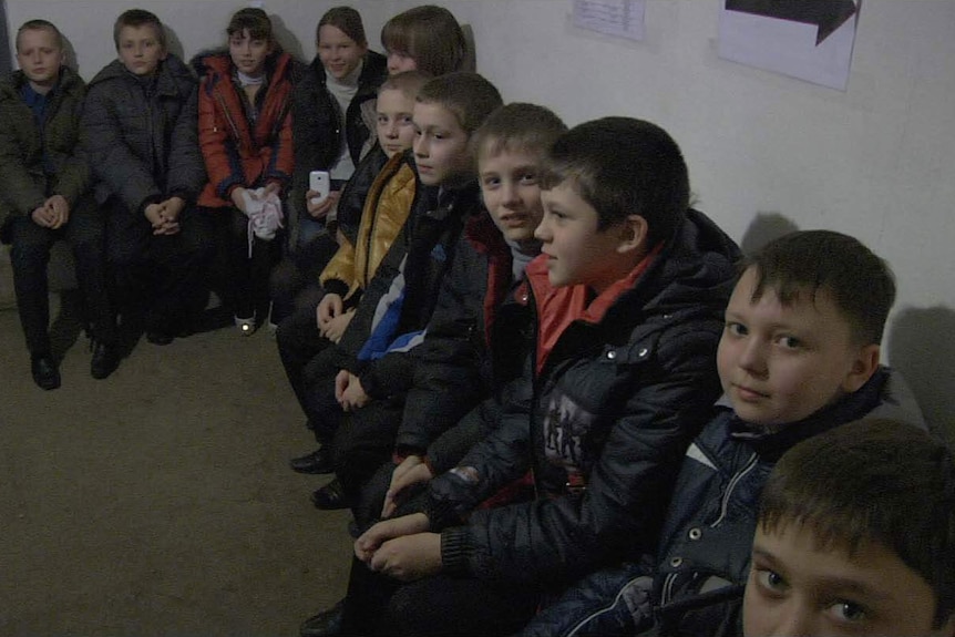 Children in a Mariupol bomb shelter