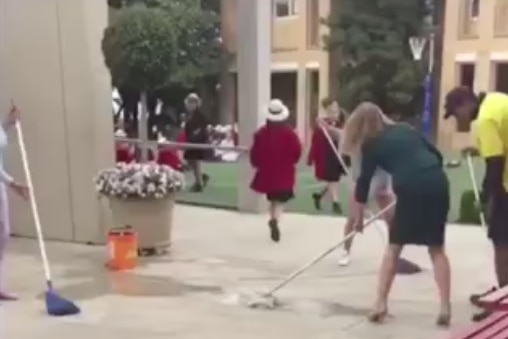 A woman using a mop