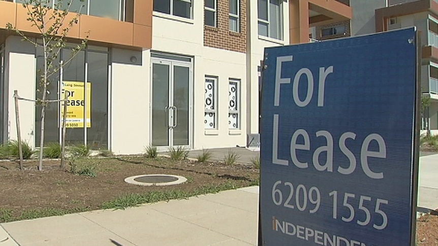 'For Lease' signs outside vacant property and in window in Canberra
