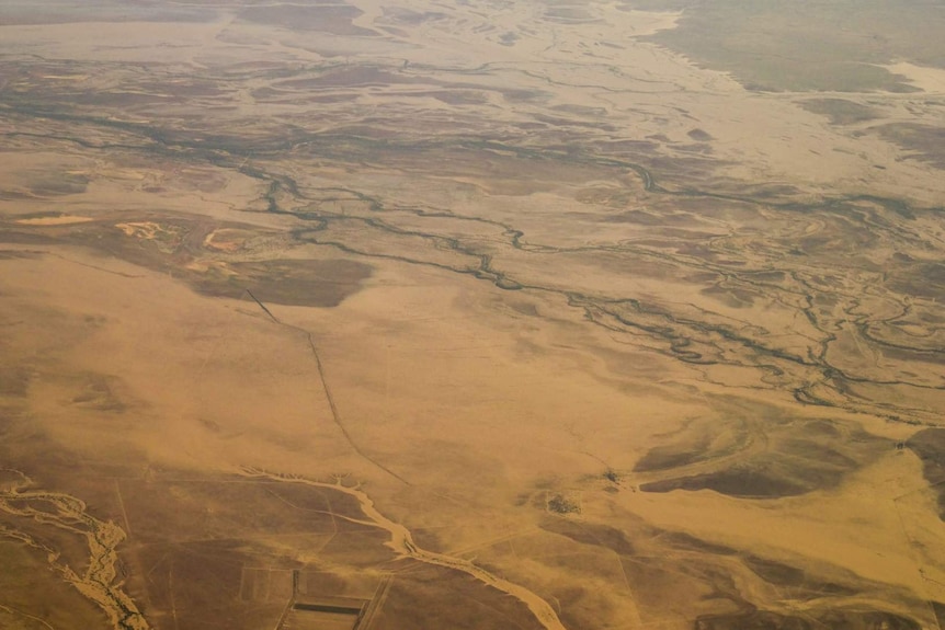 The view from a plane flying over North West Queensland shows flooding in the region.