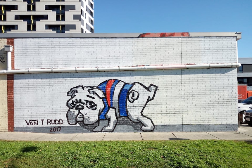A mural showing a bulldog cocking its leg.