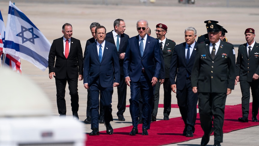 President Joe Biden participates in an arrival ceremony at Ben Gurion Airport.
