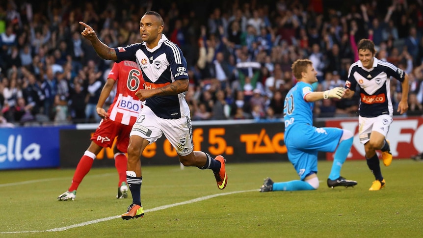 Archie Thompson celebrates his goal for Melbourne Victory against Melbourne Heart.