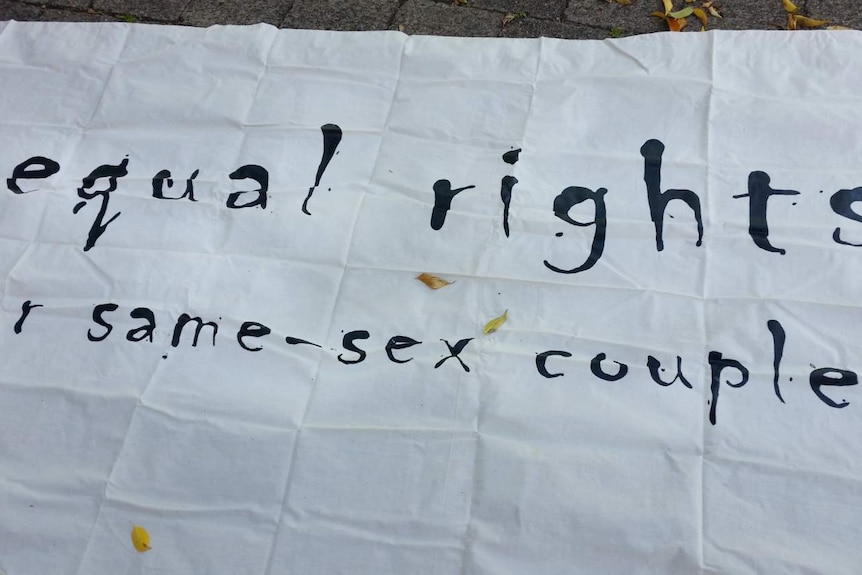 A sign reading "equal rights for same-sex couples"