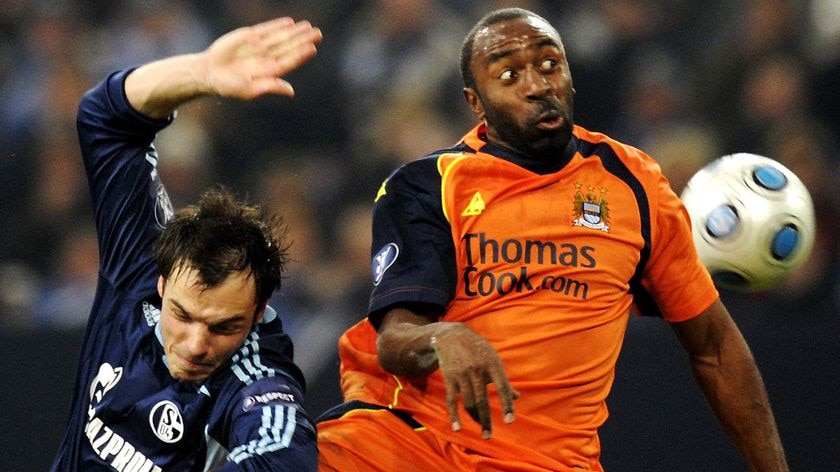 Heiko Westermann vies for the ball with Darius Vassell