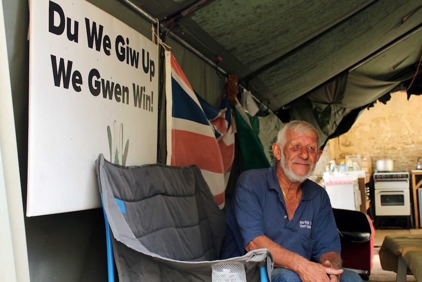 Norfolk Islander Duncan Sanderson pictured inside his tent embassy.