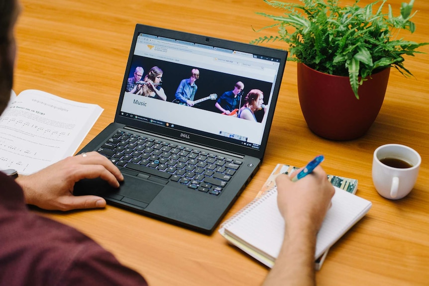 Student studies on a laptop