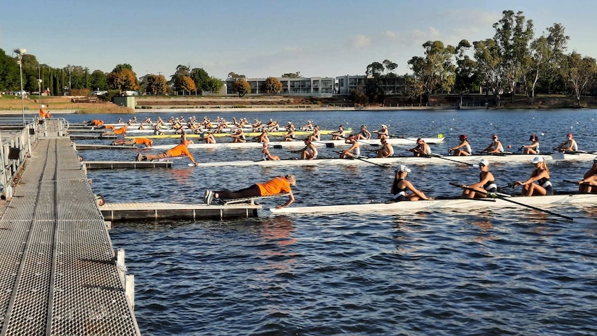 Rowing teams at the start line of Lake Nagambie.