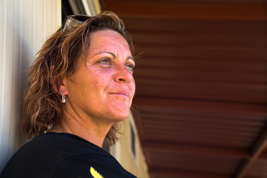 Woman looking into distance close up