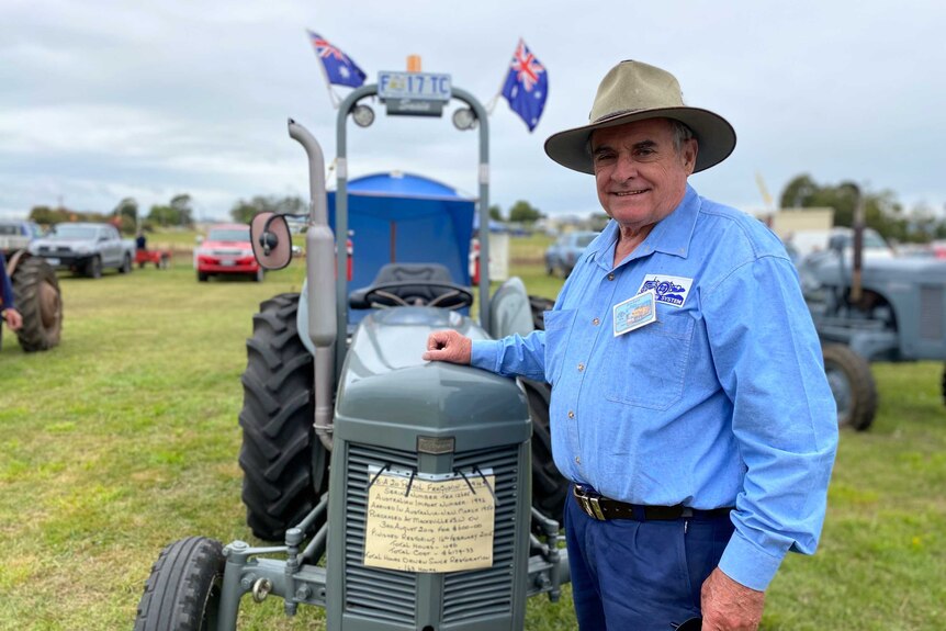 Ferguson tractor enthusiast Don Field stands in front of his restored machine