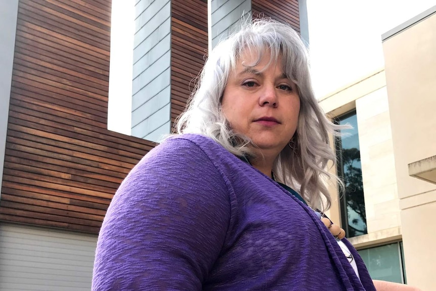 Mental health and trauma advocate Indigo Daya sits outside at the University of Western Australia in Perth.