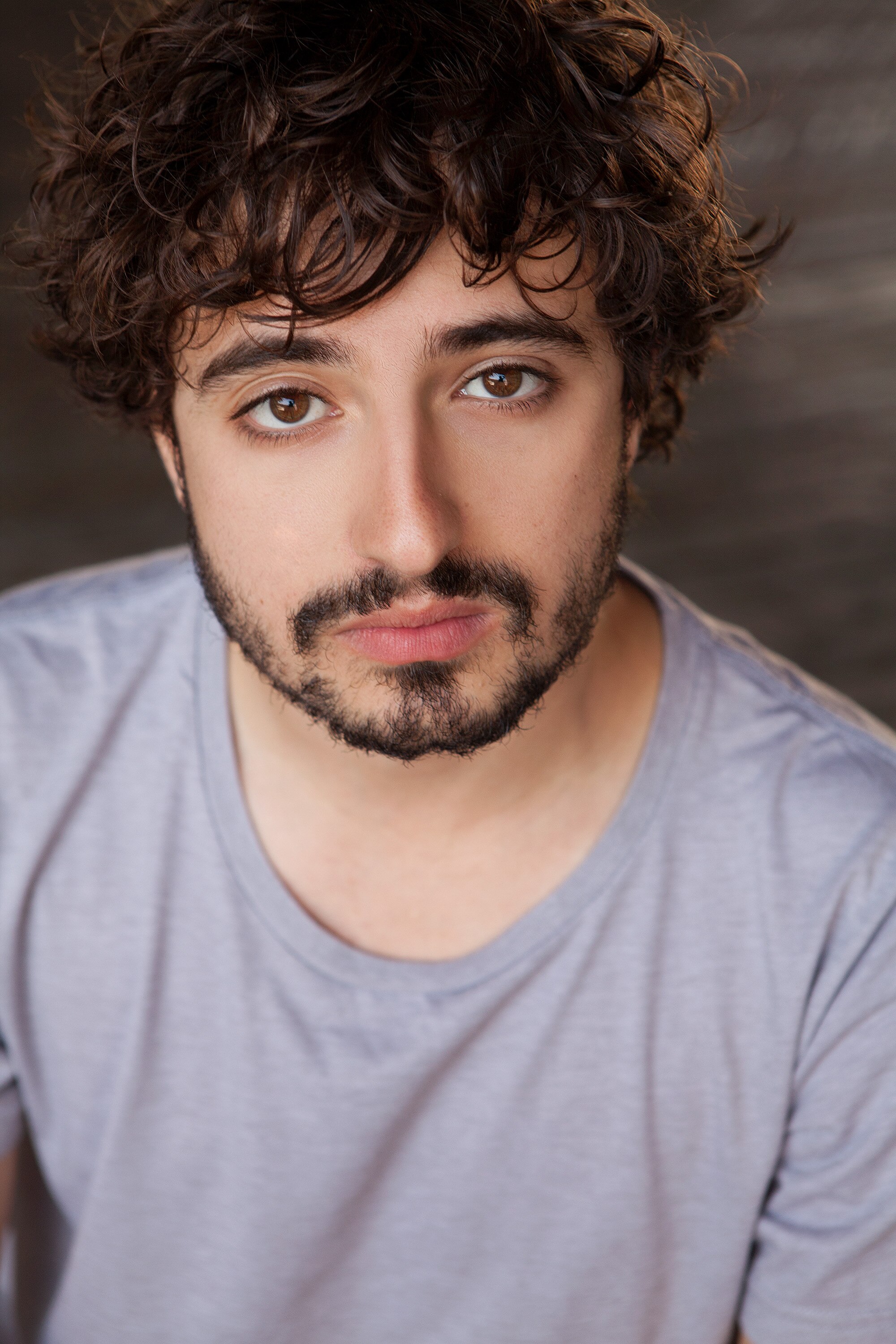 Headshot of a man in his 30s, the director Constantine Costi