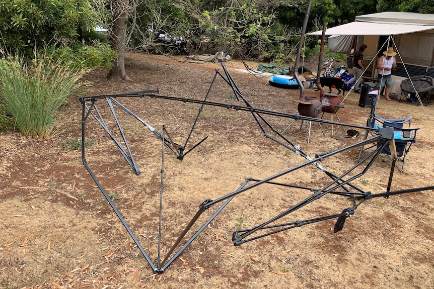 Damaged tent frame at a campground.