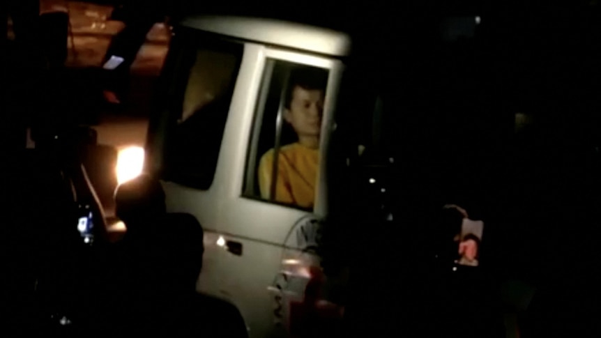 A man, seen inside a van