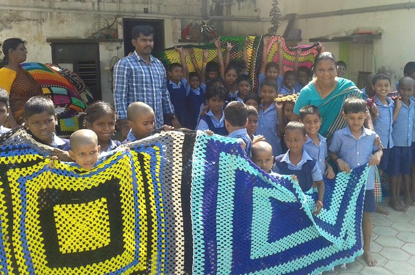 Indian kids with crochet blankets