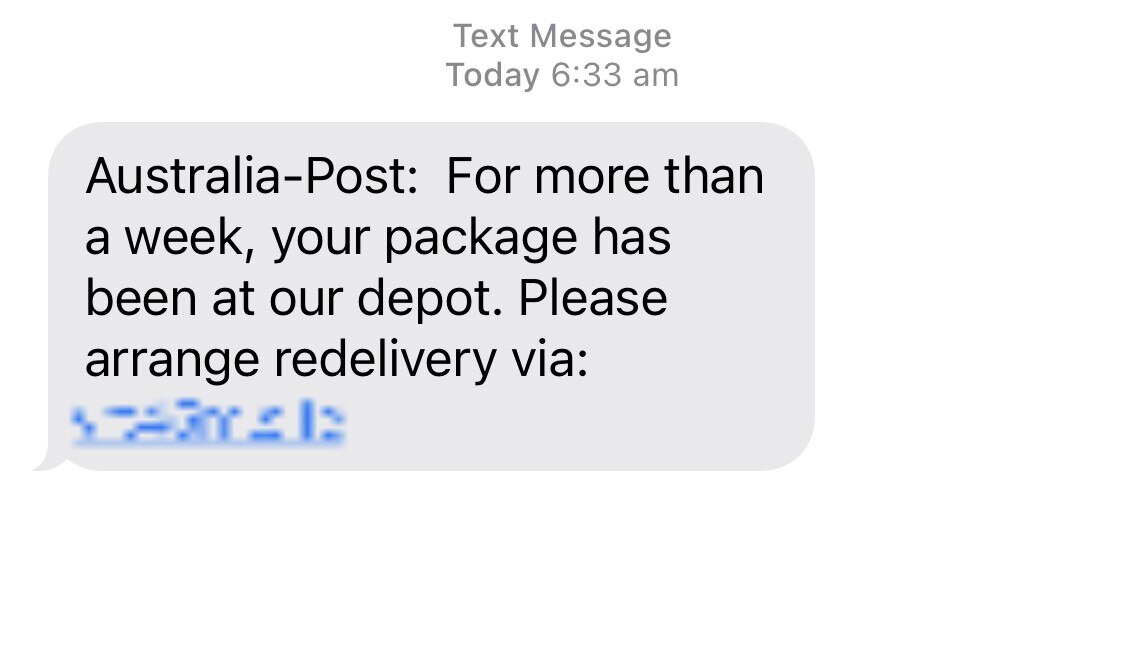 A screenshot of a text message that says a package has been "at our depot" for a week, with a prompt to arrange a 'redelivery'. 