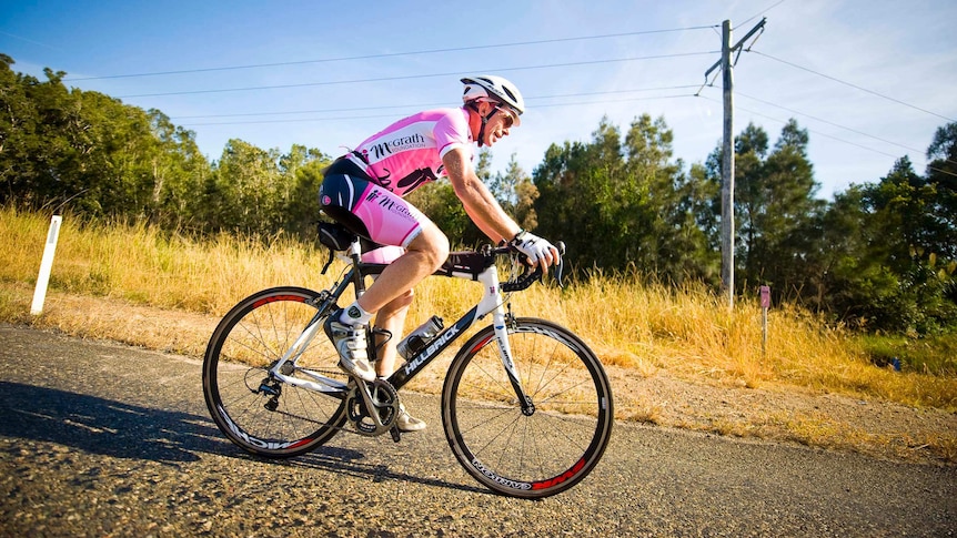 Tony Abbott rides in the Port Macquarie Ironman in 2010.