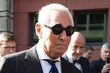 Roger Stone walks out of federal court after being convicted.